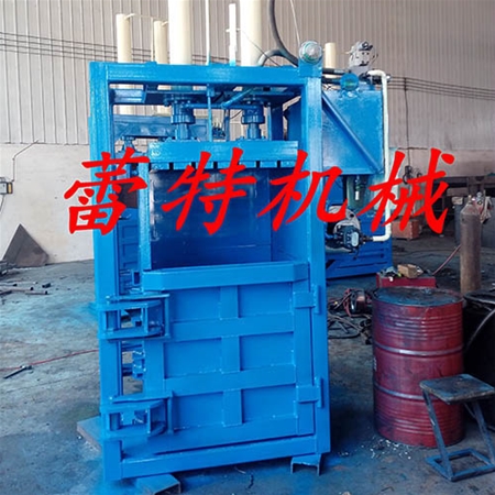 立（lì）式廢紙板打包機